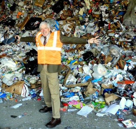 03-27-13 Ei Chair Scott Seydel is a happy camper knowing the mountain of material is ready for sorting and baling at the Pratt MRF